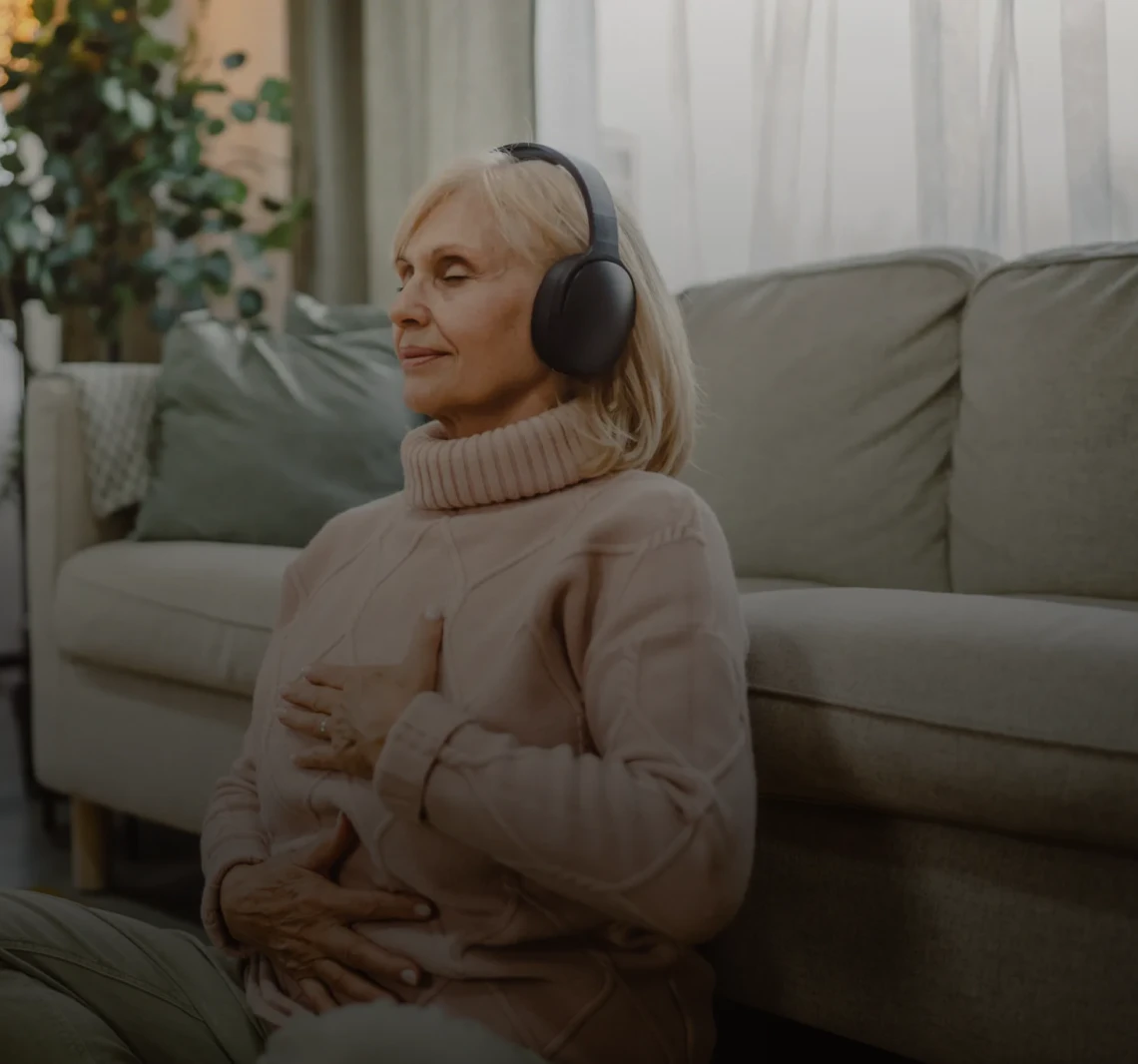 Senior woman enjoying music relaxation